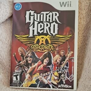 G004. Nintendo Wii Guitar Hero Aerosmith Game - Red and Yellow Cover
